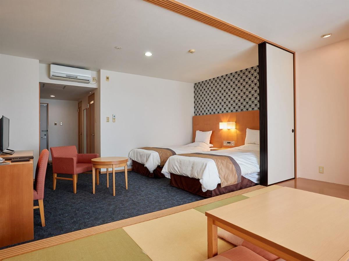 Hotel Murasakimura Yomitan Exterior photo